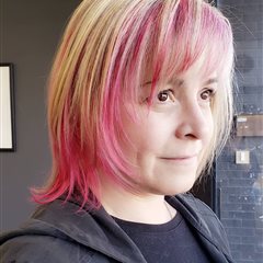 Spring has sprung.  Pink is more fun! Cut and Color done by Amy.
